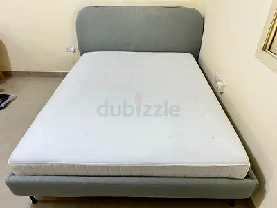 Grey fabric double bed frame with mattress - good condition.  Queen size 160cm x 200cm from ikea