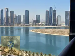 Two bedrooms and a living room in Al Khan sea view luxury tower super deluxe finishing, wardrobes, b
