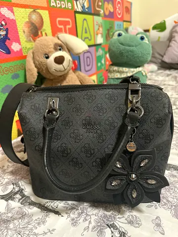 GUESS small black monogram Sling  Bag with floral charm