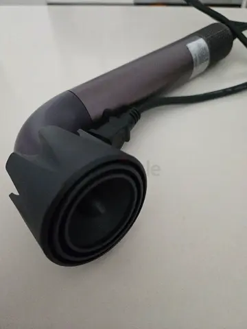 Hair dryer with concentrator nozzle