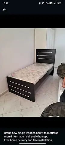 Single Wooden Bed with Mattress - Good Condition