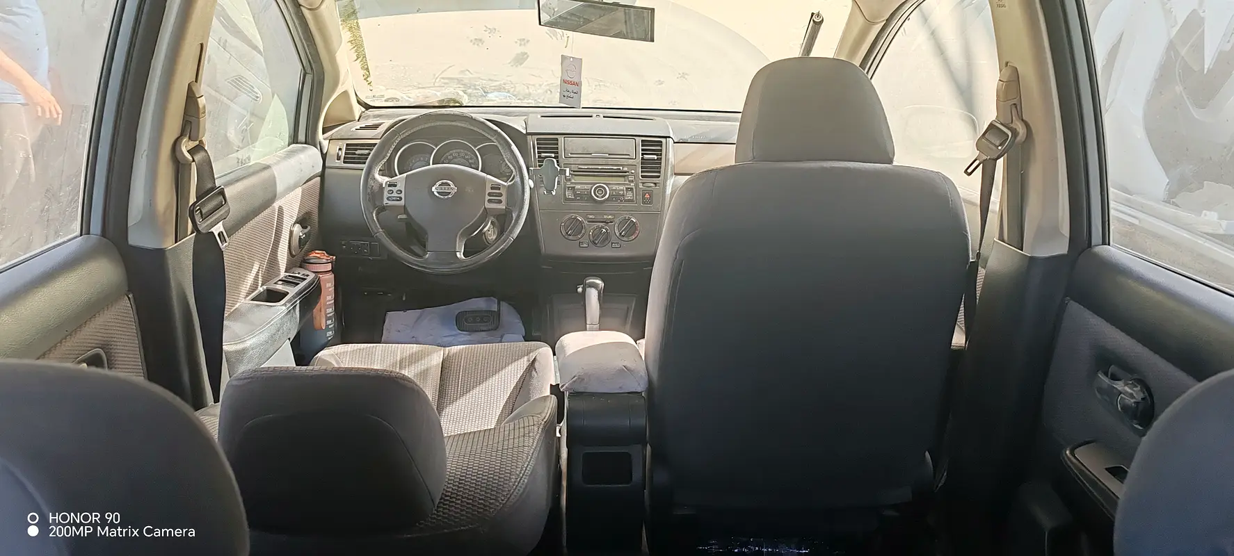 Nissan Versa 2009 — photo 1 of 8