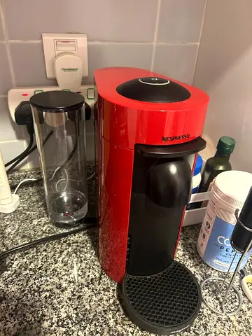 Red Nespresso Vertuo plus in great condition