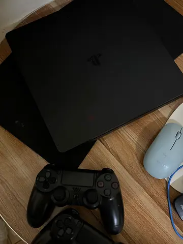 Sony PlayStation 4 Slim with Controllers