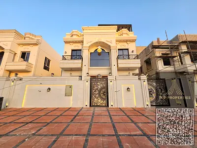 Villa for sale in Al Helio 2 – Ajman | Modern design and spacious areas with a roof terrace, including registration and ownership fees