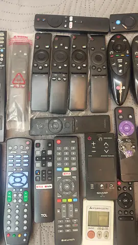 Lot of assorted TV and device remote controls — working and spare units