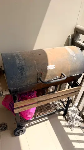 Used Barrel Charcoal Grill with Wheels