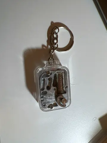 Mini Mechanical Music Box Keychain – Clear Casing