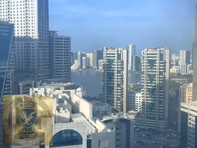 Two BR and a living room in Al Majaz 2 free parking large storage room spacious distribution area modern tower central air conditioning open view
