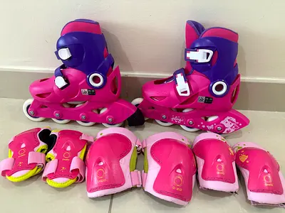 Kids Adjustable Pink Inline Skates with Protective Pads. size at the photo