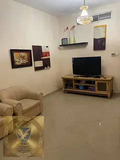 Furnished one bedroom apartment with central air conditioning open view, and two bathrooms in Al Qas