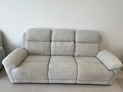 Gray upholstered headboard with built-in USB and power outlets