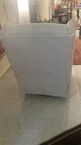 Light grey single recliner rocker armchair in good condition