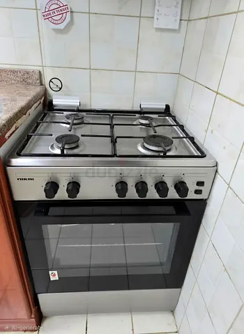 Nikai 4-Burner Gas Cooker with Oven - Good Working Condition