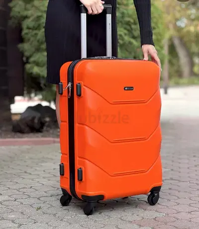 Orange hard-shell spinner suitcase with telescopic handle - medium/large