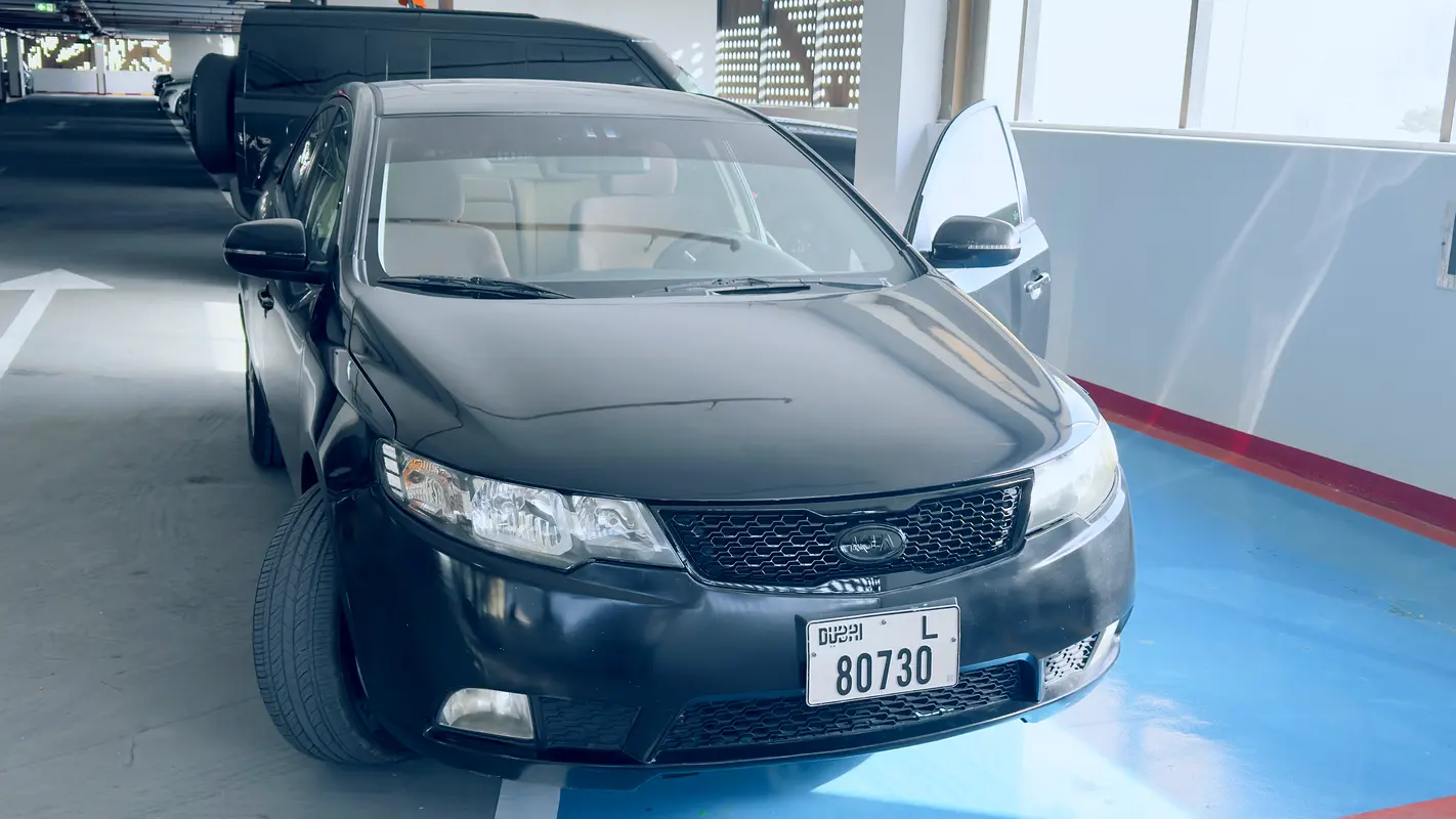 Kia Cerato 2011 — photo 1 of 7