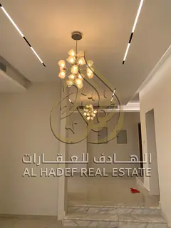 * 🛋️ Spacious majlis and family room. * 🍽️ Large kitchen. * ❄️ Central air conditionin