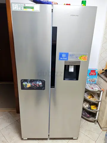 Side-by-side No Frost Fridge Freezer with Water Dispenser - Good Condition under warranty