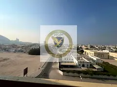 **Annual Apartment for Rent in Al Majaz 3** Free parking, spacious layout, open view, central AC, fr