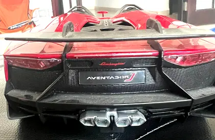 Red Lamborghini Aventador ride-on toy car, RASTAR brand  - light usage in very good condition