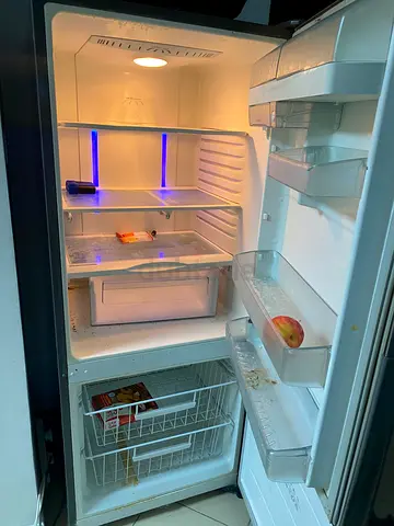 Used single-door refrigerator with freezer compartment - working condition