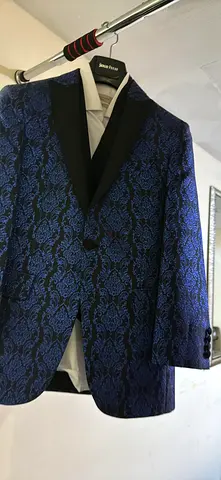 Blue patterned tuxedo jacket with black satin lapel - size likely M/L
