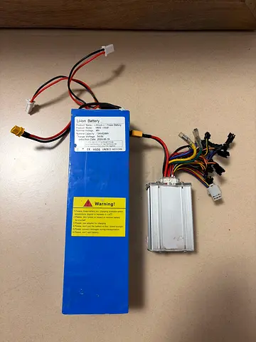 48v escooter battery and controller and 1800w motor with tire for sale. All working.