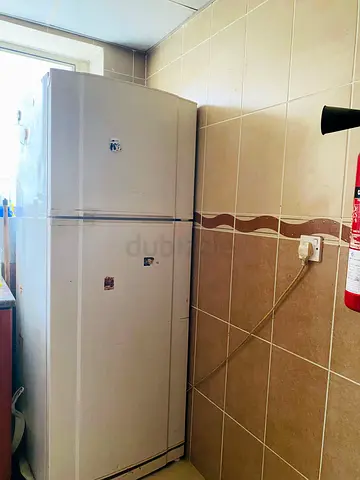 Used GE Top-Freezer Refrigerator - Good Working Condition