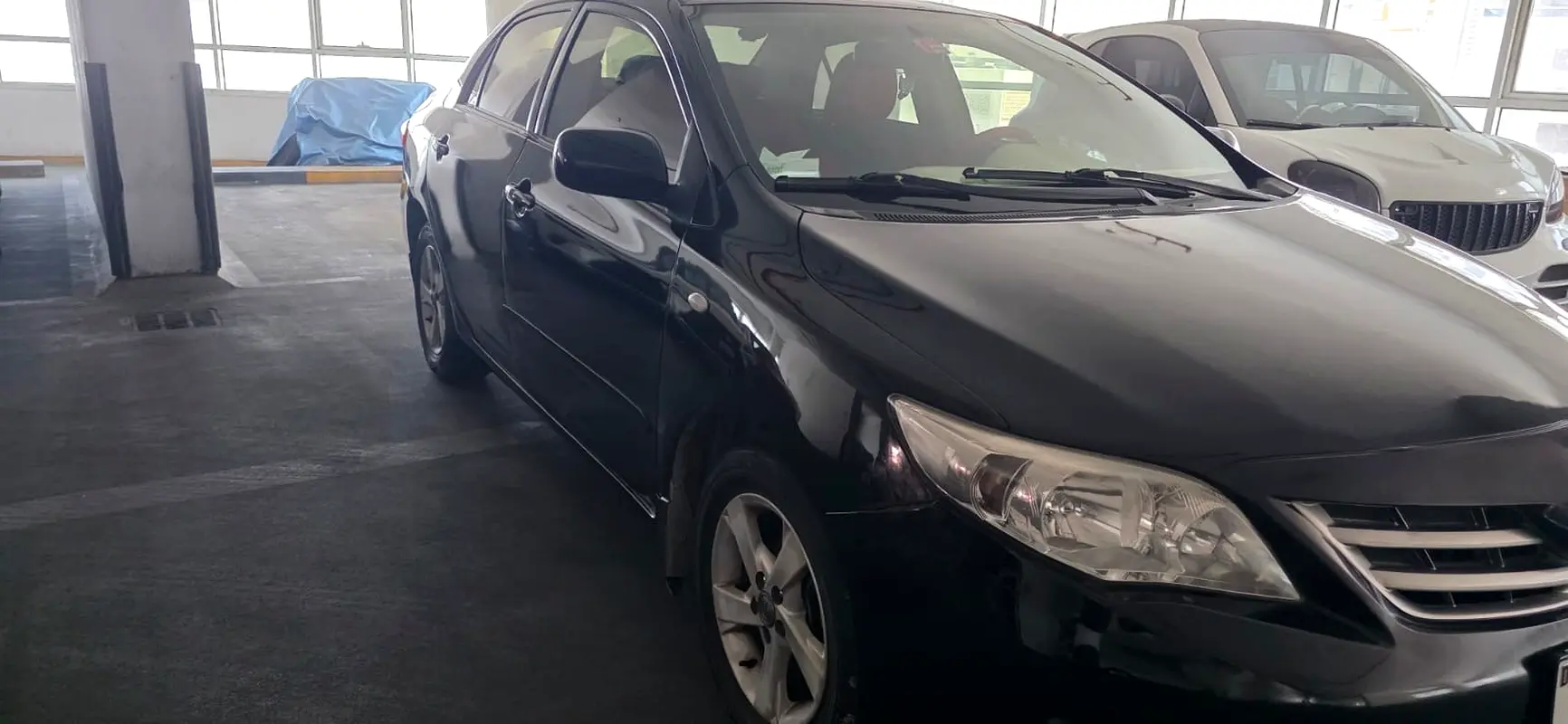 Toyota Corolla 2012 — photo 1 of 8