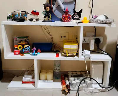 Small white TV console / storage shelf - good condition