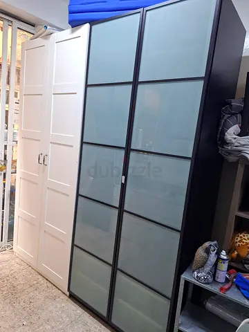 We are selling used 2 door  1 white and black cabinets wardrobe  big size good condition for sale