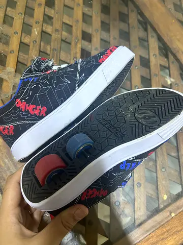 Kids Black Canvas Wheel Shoes (Heely-style) with Graffiti Print — Preowned size 32