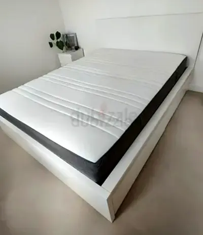 ikea malm king bed with ikea firm mattress   having 2 storage units under the bed