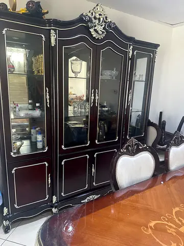 ‏dining table with buffet