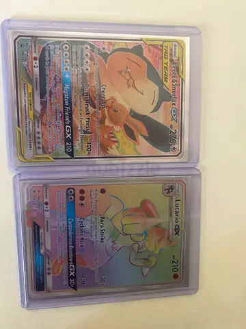 Eevee  Snorlax Tag Team GX and Lucario GX Rainbow Rare Pokémon Cards