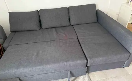 Grey L-shaped Sofa Bed with Storage - Good Condition