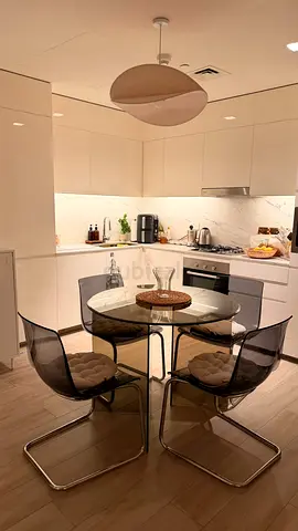 Glass round table and 4 chairs