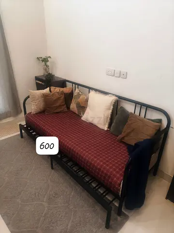 Double bed/ sofa bed with mattress and throw pillows