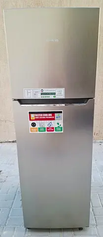 Brand Siemens double door fridge, its color is silver gray, condition is perfect cooling