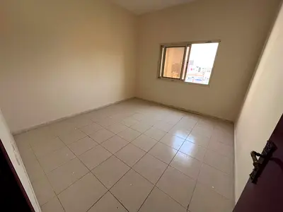 1 Bedroom Hall for Rent in Al Nuaimiya 2 Ajman + King Faisal Street + Separate Living Room + Excellent Layout + Central AC + Prime Service Location +