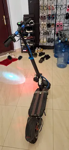 Electric Scooter with Dual Suspension and Rear Light
