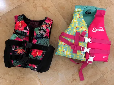 Two kids life jackets / buoyancy vests - size youth small
