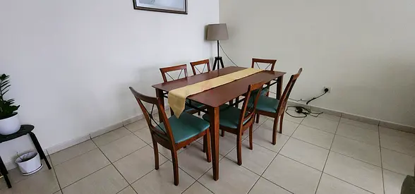 Solid Wood 6-Seater Dining Table with Chairs - Good Condition.