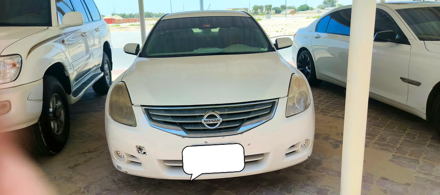 Nissan Altima 2012 — photo 1 of 12