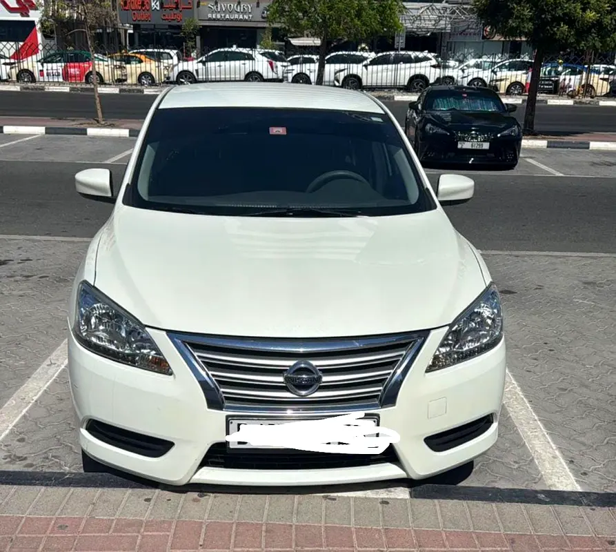 Nissan Sentra 2014 — photo 1 of 6