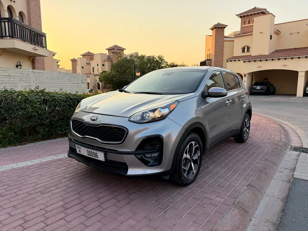 Kia Sportage 2021 — photo 1 of 15