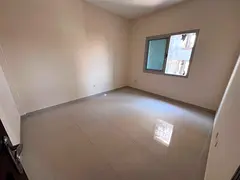 2 Bedroom Hall for Rent in Al Hamidiya 1 Ajman + Balcony with Open View + 2 Bathrooms + Central AC +