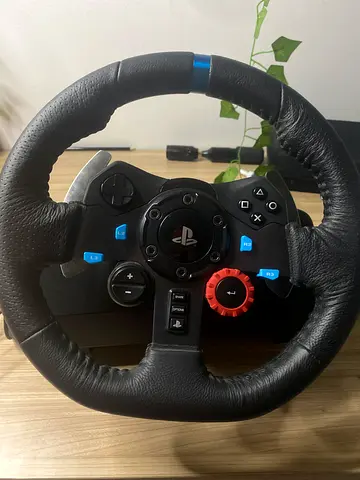 Logitech-style PlayStation racing wheel with pedals
