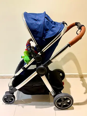Mothercare , baby stroller + bassinet slightly used ,in good condition with spare adapters