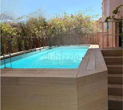 Above Ground Swimming Pool with Wooden Decking